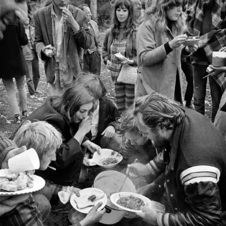 hippies eating stew and bread in Golden Gate Park