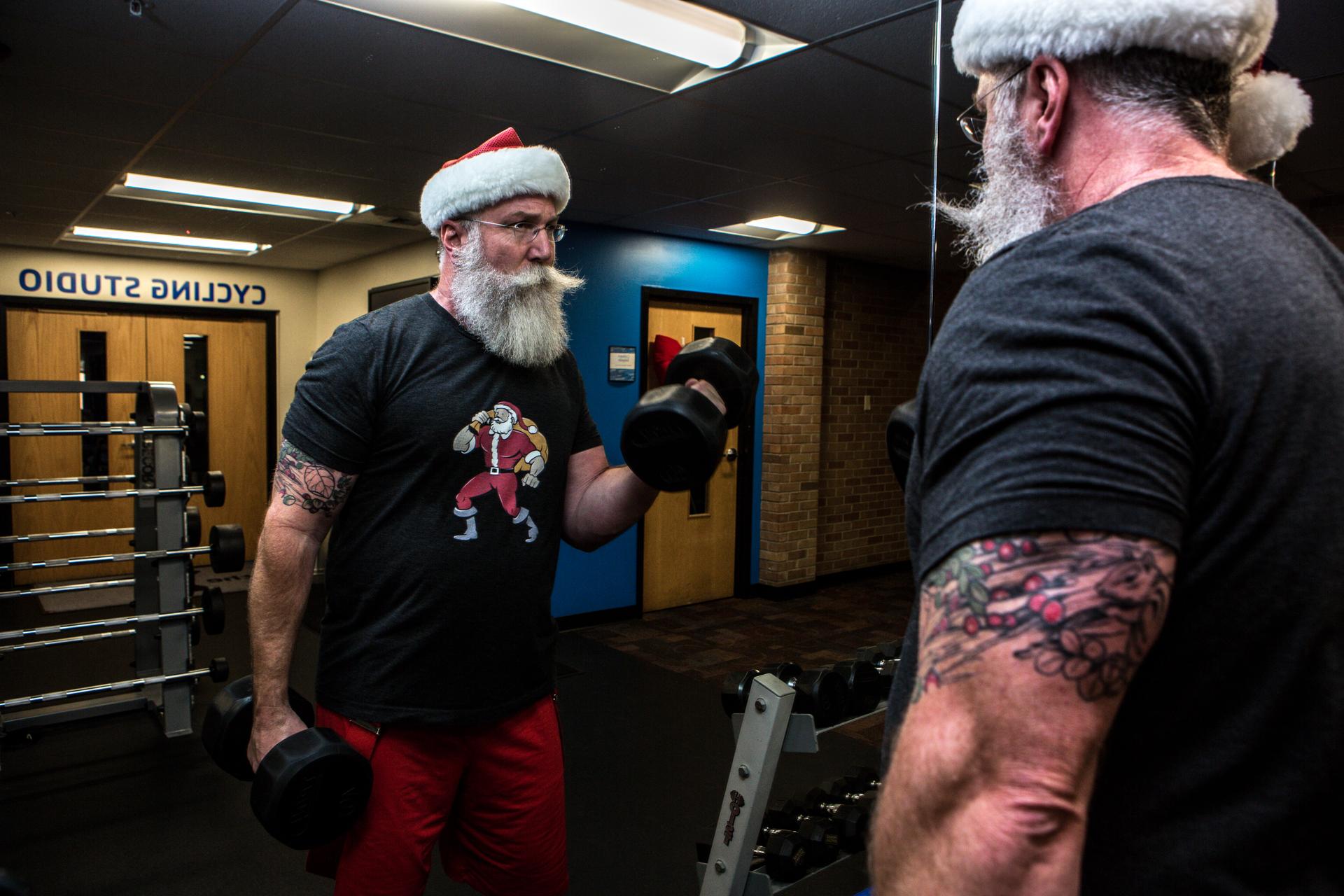 Santa lifts weights